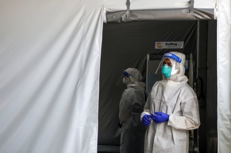 A medical worker looks on at the coronavirus disease (COVID-19) testing centre in Kuala Lumpur Hospital, in Kuala Lumpur, Malaysia February 16, 2021. REUTERS/Lim Huey Teng
