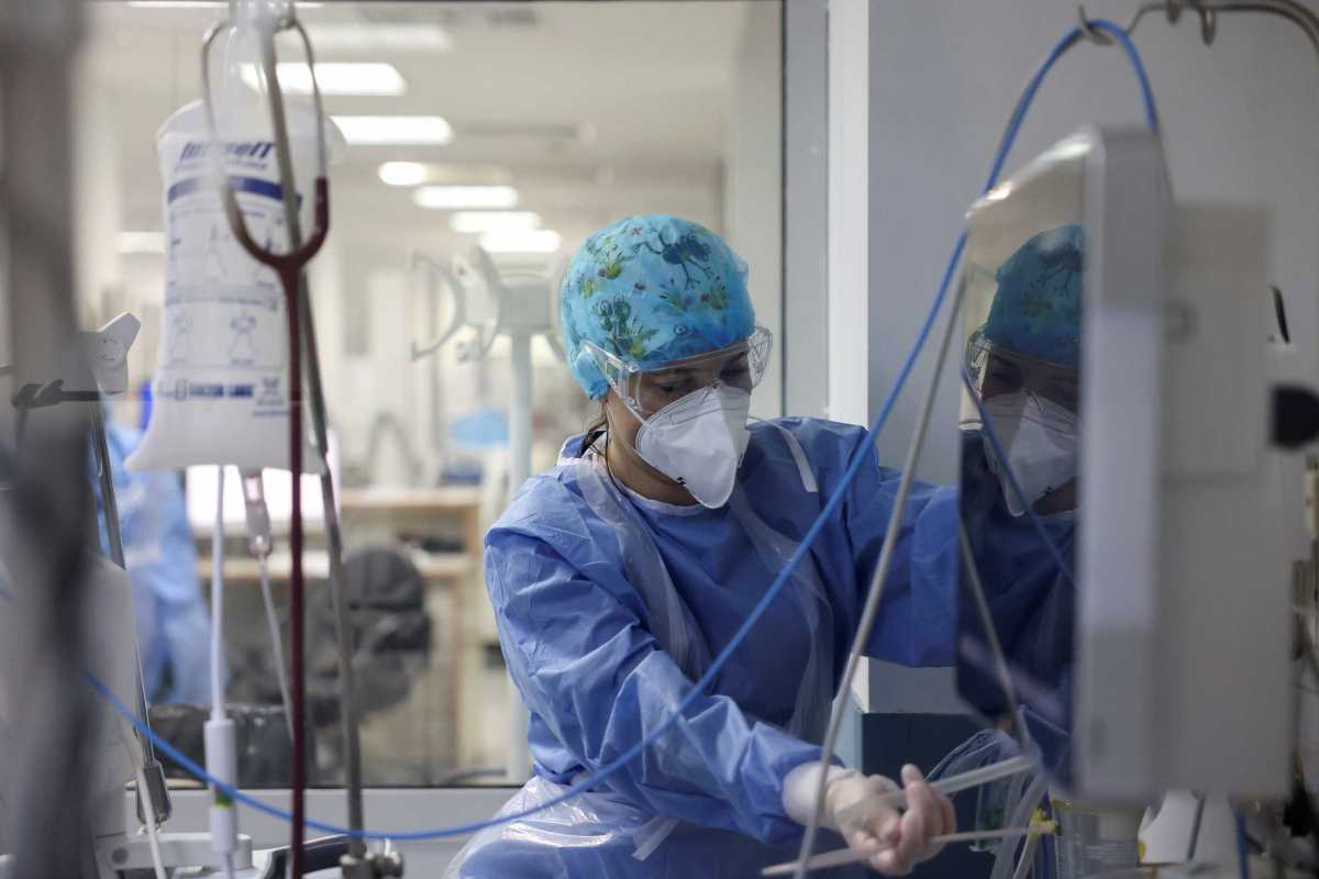FILE PHOTO: Intensivist Iliana Ioannidou is reflected on a monitor at the intensive care unit (ICU) of the Sotiria hospital, amid the coronavirus disease (COVID-19) pandemic, in Athens, Greece, February 28, 2021. REUTERS/Giorgos Moutafis/File Photo
