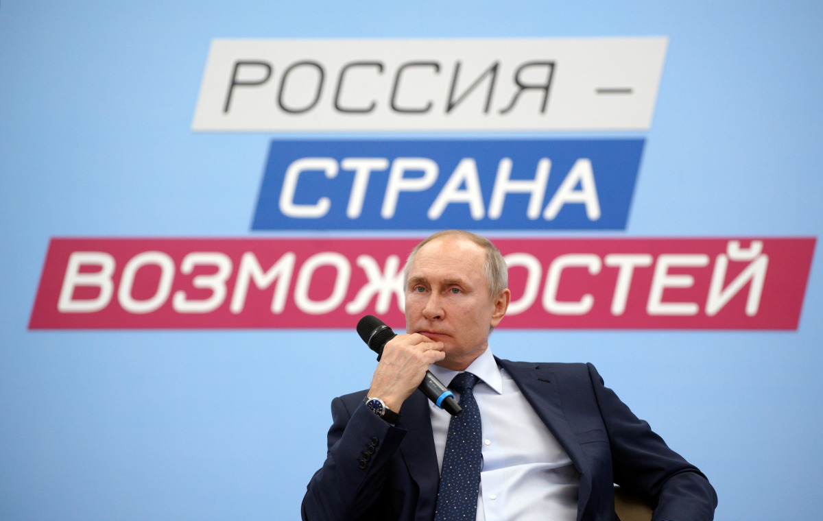 Russian President Vladimir Putin attends a session of the supervisory council of 