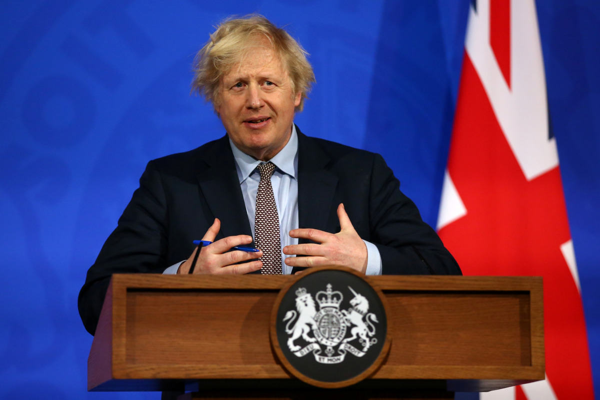 Britain's Prime Minister Boris Johnson holds a news conference on the coronavirus disease (COVID-19) pandemic, in London, Britain March 29, 2021. Hollie Adams/Pool via REUTERS
