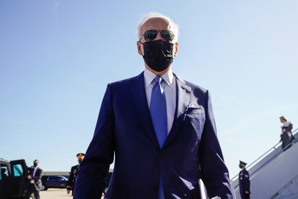 U.S. President Joe Biden speaks to the media as he arrives in Newcastle, Delaware, U.S., March 26, 2021. REUTERS/Joshua Roberts
