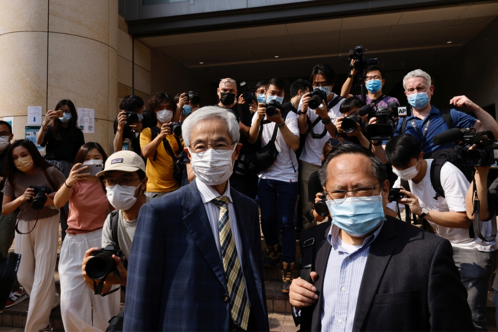 Democratic Party founder and barrister Martin Lee and Albert Ho arrive at the West Kowloon Courts for verdicts in landmark unlawful assembly case, in Hong Kong, China April 1, 2021. REUTERS/Tyrone Siu