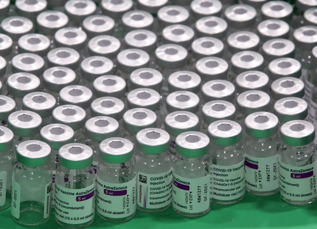 FILE PHOTO: Empty vials of Oxford/AstraZeneca's COVID-19 vaccine are seen at a vaccination centre in Antwerp, Belgium March 18, 2021. REUTERS/Yves Herman/File Photo
