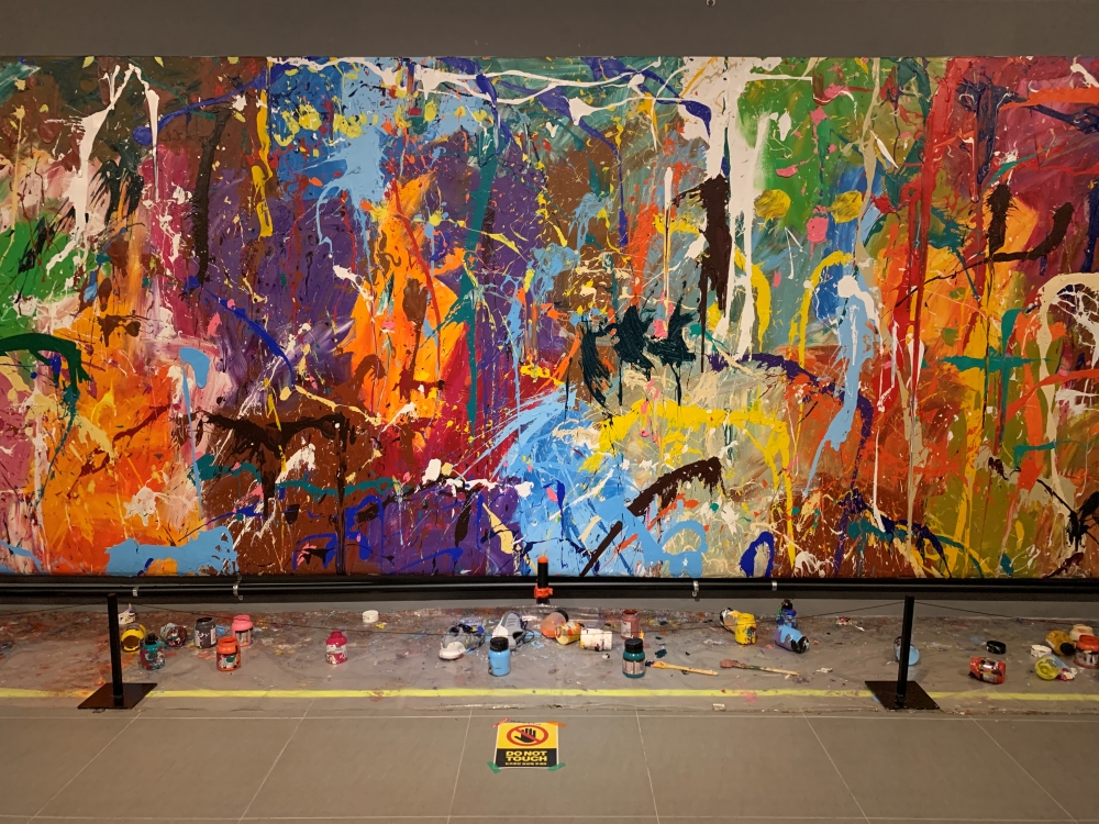 The marks painted by a young couple are seen on the graffiti artwork of New York-based artist Jon One at a gallery in Seoul, South Korea April 2, 2021. REUTERS/Minwoo Park