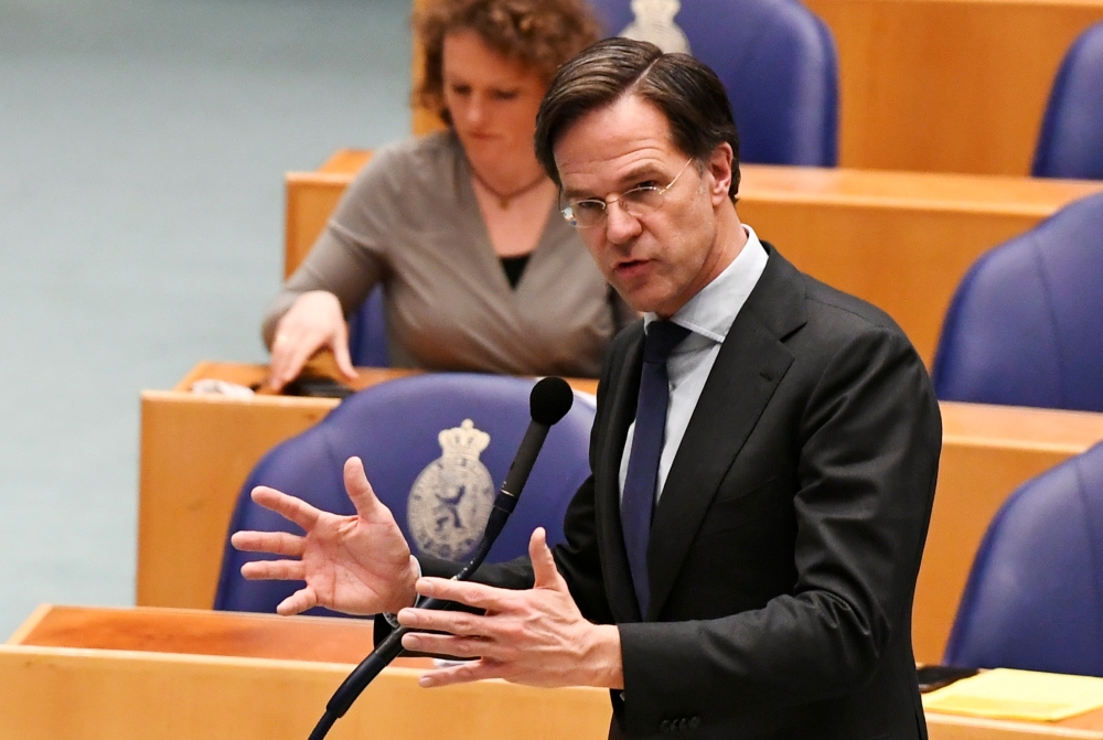 Dutch Prime Minister Mark Rutte attends a debate over remarks he made during talks to form a new government following the March 17 national elections, in The Hague, Netherlands April 2, 2021. REUTERS/Piroschka van de Wouw