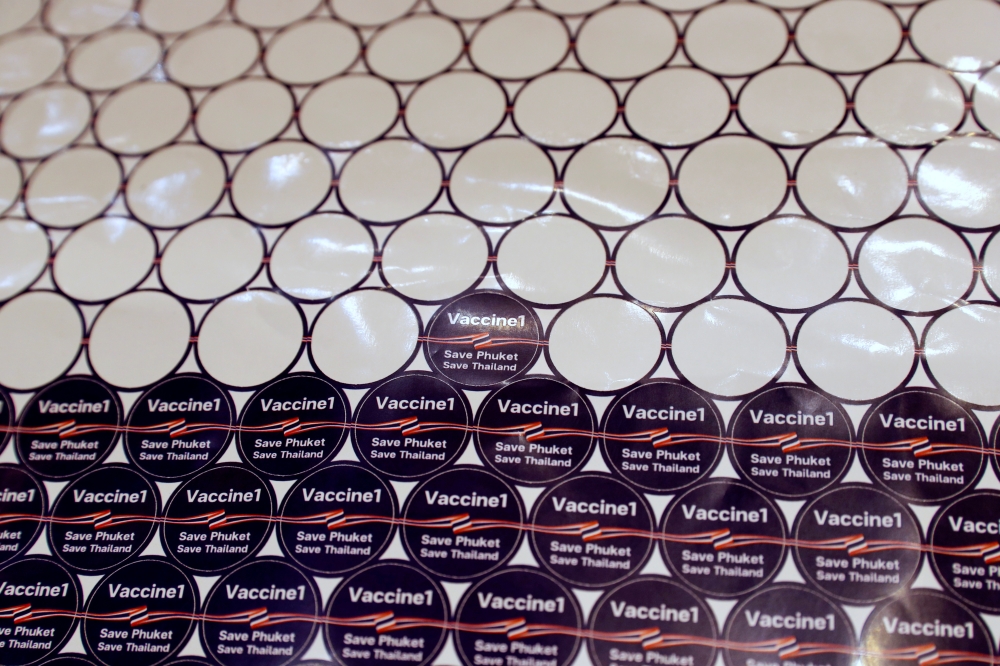 Stickers are seen after people receive the Sinovac COVID-19 vaccine as the Thai resort island of Phuket rushes to vaccinate its population amid the coronavirus disease (COVID-19) outbreak, and ahead of a July 1 ending of strict quarantine for overseas vis