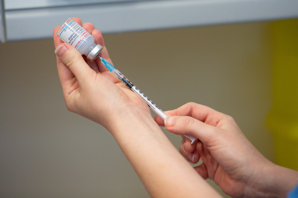 A nurse prepares a dose of the Moderna coronavirus disease (COVID-19) vaccine at the Glangwili General Hospital in Carmarthen, Wales, Britain April 7, 2021. Jacob King/Pool via REUTERS
