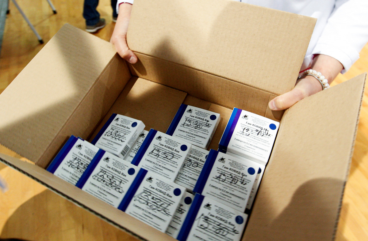 A nurse distributes Russia's Sputnik V coronavirus disease (COVID-19) vaccine at a sport centre, as the country starts mass inoculation campaign with the Russian vaccine donated by Serbia, in Skopje, North Macedonia April 5, 2021. REUTERS/Ognen Teofilovsk
