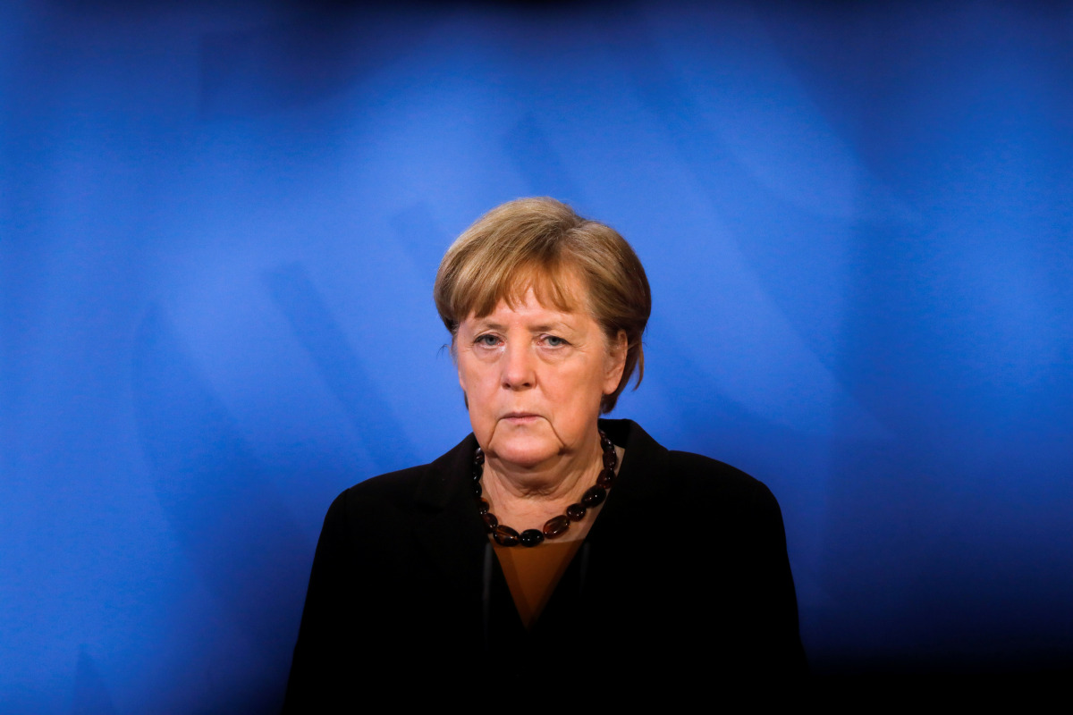 FILE PHOTO: German Chancellor Angela Merkel briefs the media after a virtual meeting with federal state governors at the chancellery in Berlin, Germany, March 30, 2021. Markus Schreiber/Pool via REUTERS/File Photo
