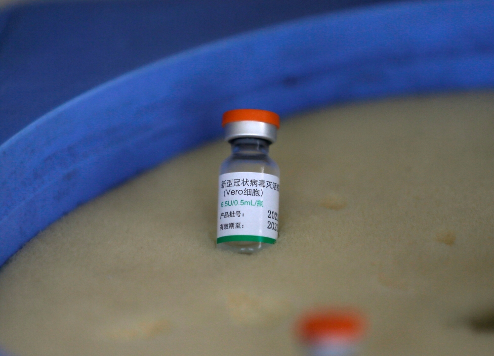 A dose of Sinopharm vaccine against the coronavirus disease (COVID-19), gifted by China's government for citizens living abroad, is pictured at Colombo Port City project premises in Colombo, Sri Lanka, April 5, 2021. REUTERS/Dinuka Liyanawatte