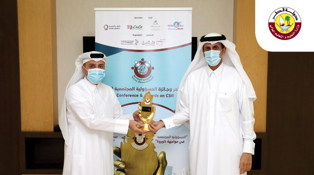 Minister of Education and Higher Education, H E Dr Mohammad bin Abdulwahid Al Hammadi, receiving the Social Responsibility Award for 2020 from Sheikh Dr. Khalid bin Thani bin Abdullah Al Thani, Chairman of the Board of Directors of Dar Al Sharq Group, yes