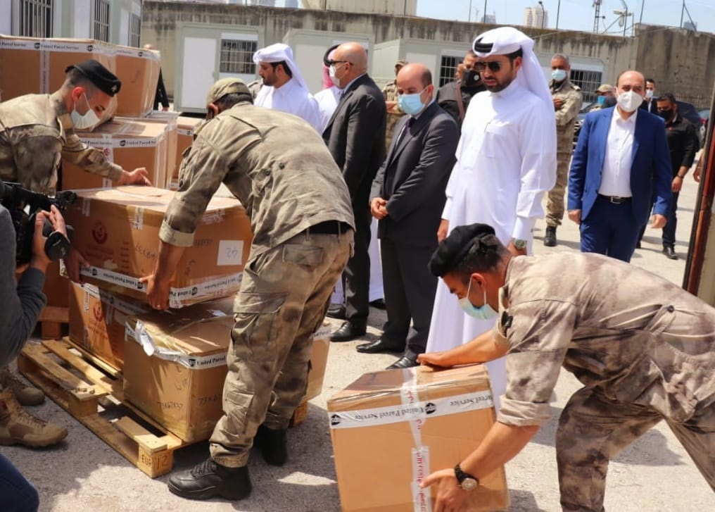 The officials from Qatar and Lebanon during the arrival of Qatari aid shipment in Beirut, Lebanon, yesterday. 