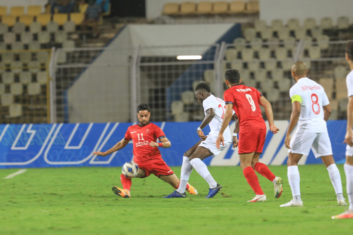 Al Rayyan and Persepolis players vie for the ball possession during yesterday's AFC Champions League Group E match played in Goa, India. Pic: AFC