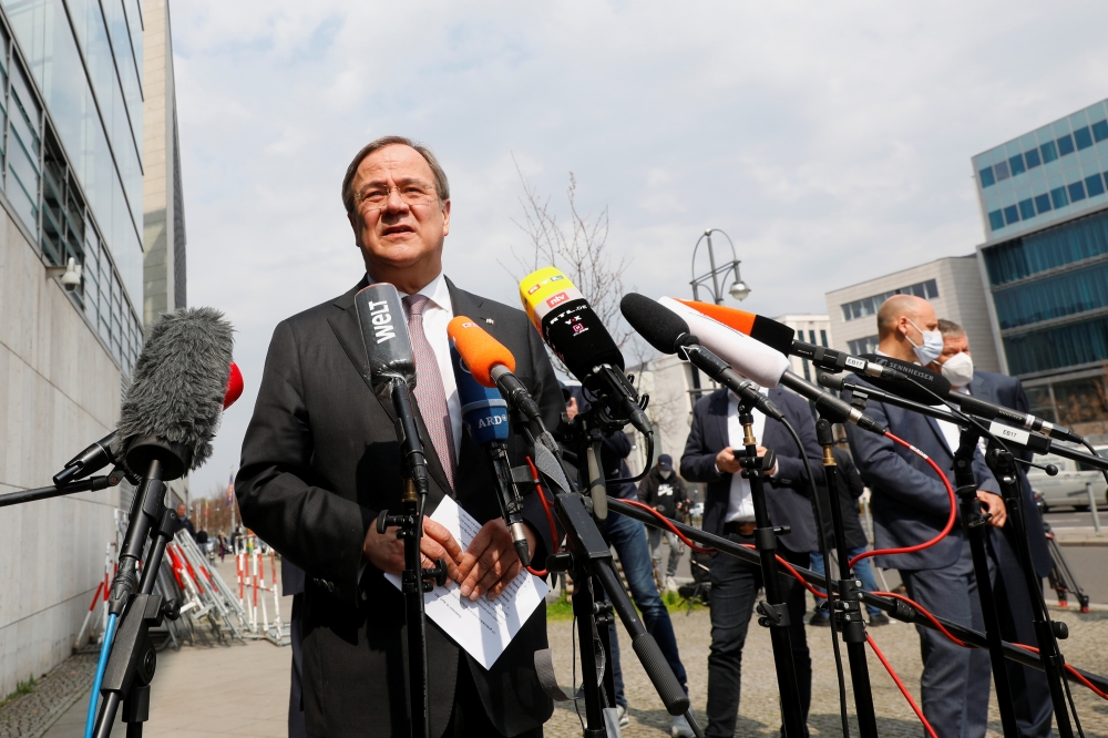 North Rhine-Westphalia's State Premier and head of Germany's conservative Christian Democratic Union (CDU) party Armin Laschet speaks to journalists after meetings at the CDU headquarters in Berlin, Germany, April 19, 2021. Reuters/Michele Tantussi