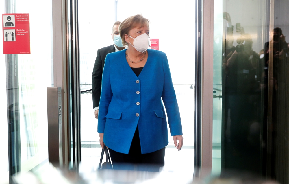 German Chancellor Angela Merkel arrives to testify before a parliament committee investigating Wirecard, in Berlin, Germany April 23, 2021. REUTERS/Michele Tantussi