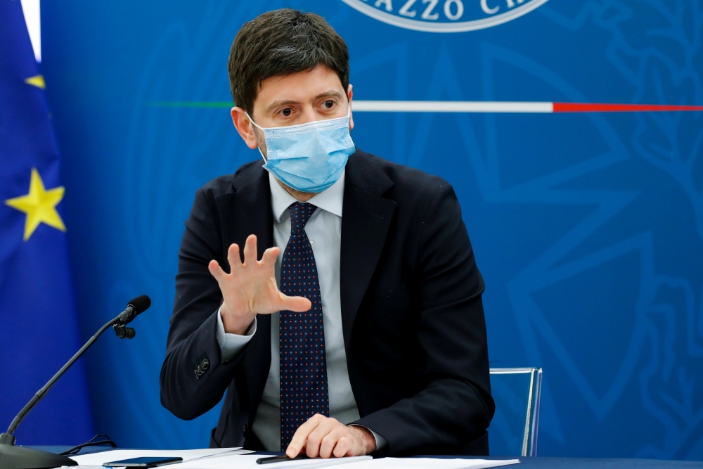 Italy's Health Minister Roberto Speranza gestures as he speaks during a news conference where Italy's Prime Minister Mario Draghi (not pictured) is expected to map out the country's next moves in loosening coronavirus disease (COVID-19) restrictions, in R
