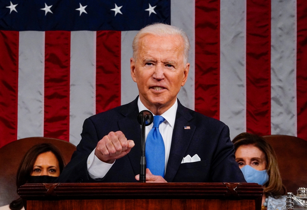 US President Joe Biden addresses a joint session of Congress in the House chamber of the U.S. Capitol in Washington, U.S., April 28, 2021. Melina Mara/Pool via Reuters