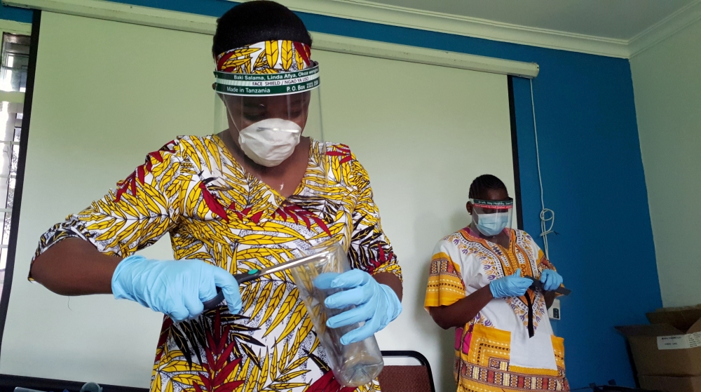 File photo: Workers prepare face shields from recycled plastics at the Zaidi Recyclers workshop as a measure to stop the spread of coronavirus disease (COVID-19) in Dar es Salaam, Tanzania May 21, 2020. Reuters/Stringer//File Photo