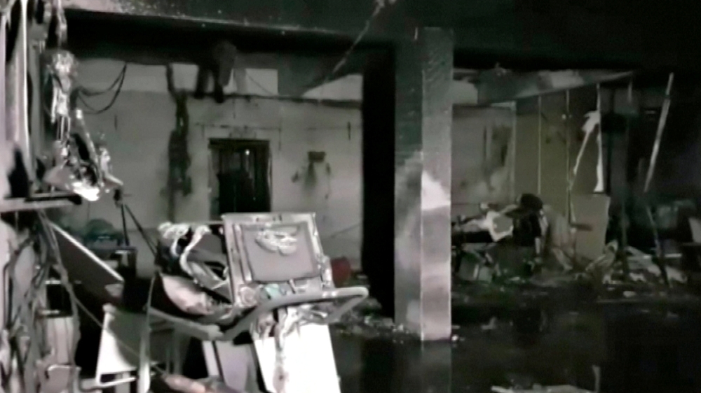 Damaged equipment and furniture are seen in the burnt interior of a hospital treating coronavirus disease (COVID-19) patients, after a deadly fire, in India's western Gujarat state, May 1, 2021, in this still image obtained from video. 

