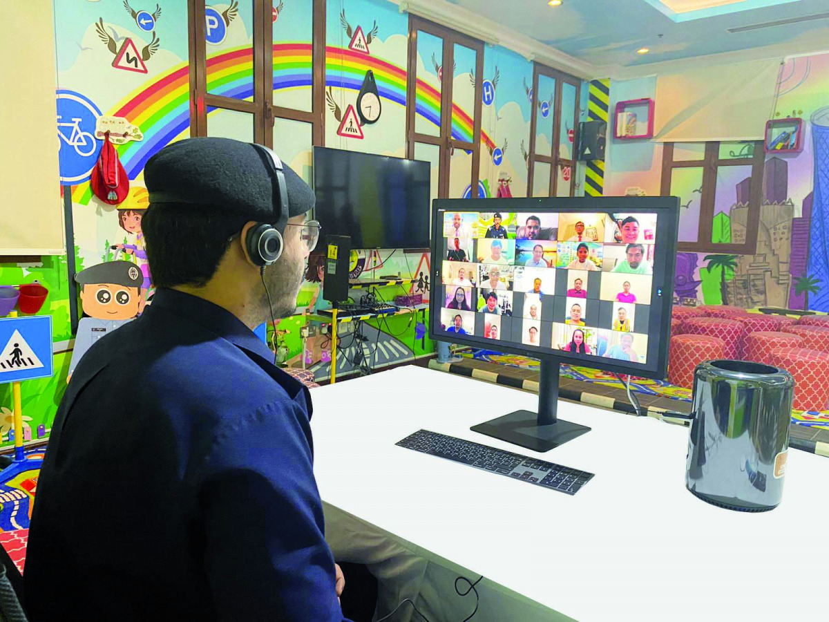 A traffic officer delivers an online lecture to raise awareness of traffic rules among public.  