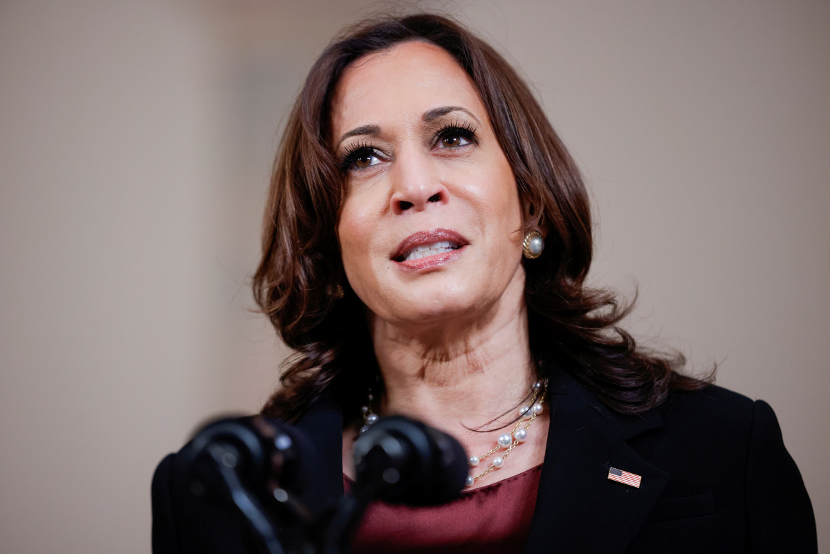 FILE PHOTO: U.S. Vice President Kamala Harris speaks in the Cross Hall at the White House in Washington, U.S., April 20, 2021. REUTERS/Tom Brenner/File Photo
