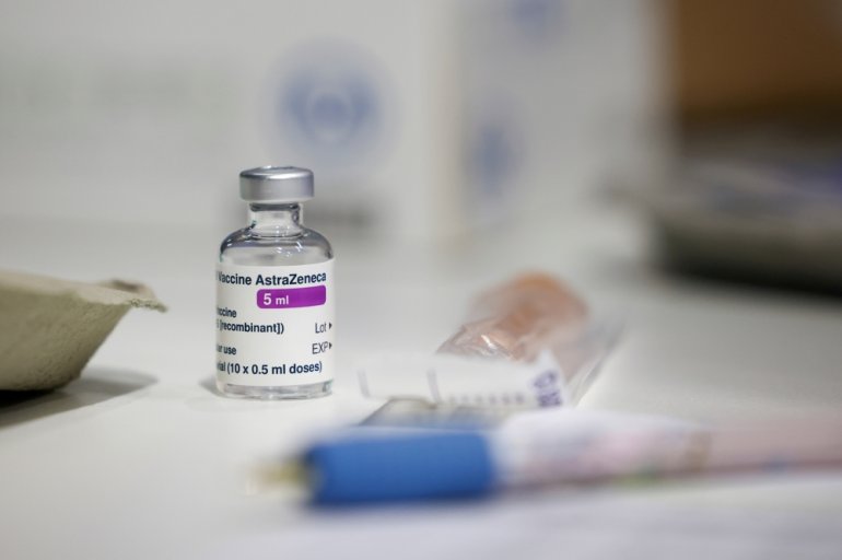 A vial of AstraZeneca coronavirus vaccine is seen at a vaccination centre in Westfield Stratford City shopping centre, amid the outbreak of coronavirus disease (COVID-19), in London, Britain, February 18, 2021. REUTERS/Henry Nicholls/File Photo