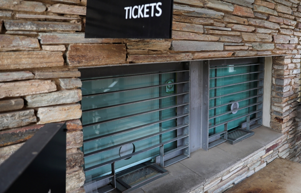 A closed ticket office is pictured at the entrance of the Apartheid Museum, one of dozens of heritage attractions and art galleries around the country forced to close their doors due to the coronavirus disease (COVID-19) pandemic, in Johannesburg , South 