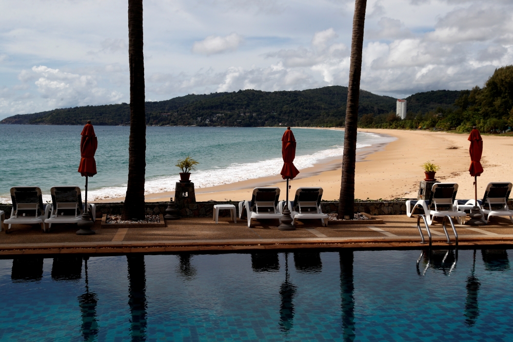 File photo: An empty hotel and beach which have opened for visitors is seen in Karon, Phuket Island, Thailand March 31, 2021. Reuters/Jorge Silva/File Photo