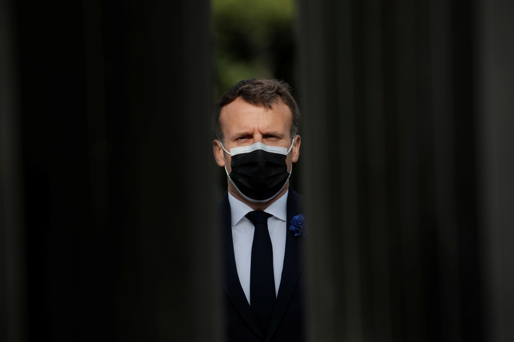 French President Emmanuel Macron attends a ceremony to mark the end of World War II, in Paris, France on May 8, 2021. (Christophe Ena/ REUTERS)