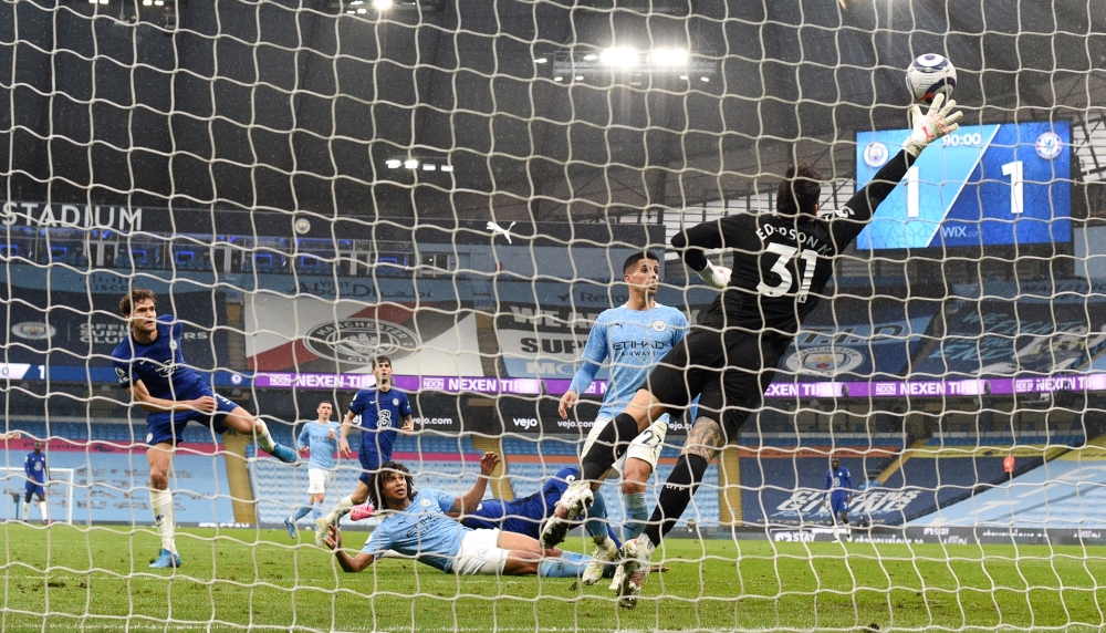 Chelsea's Marcos Alonso scores their second goal (REUTERS/Shaun Botterill)