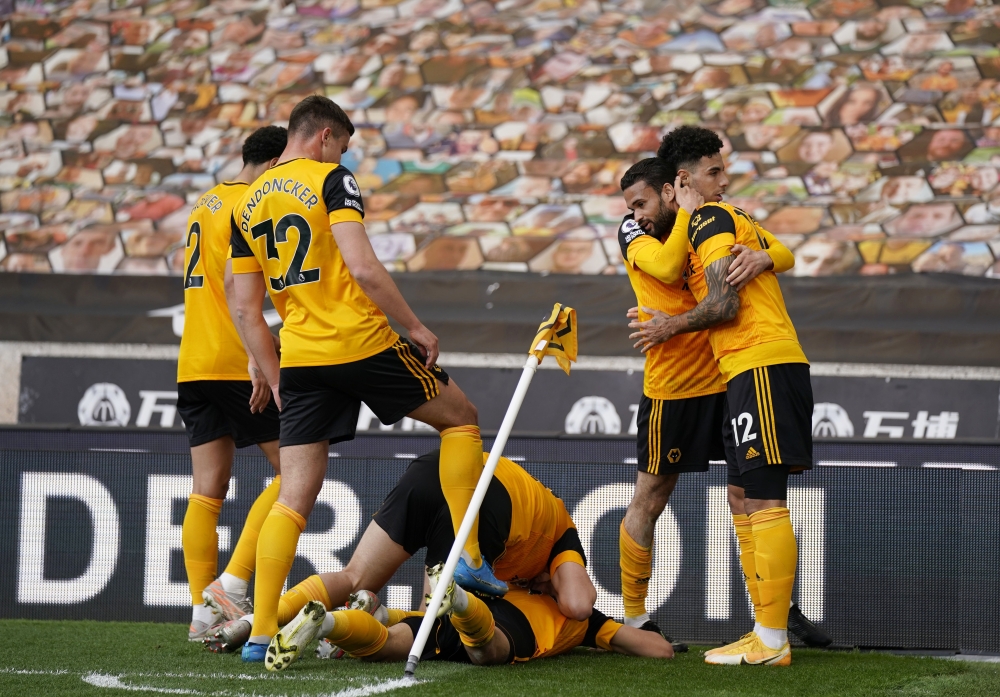 Wolverhampton Wanderers' Morgan Gibbs-White celebrates scoring their second goal with teammates Pool via REUTERS/Tim Keeton 