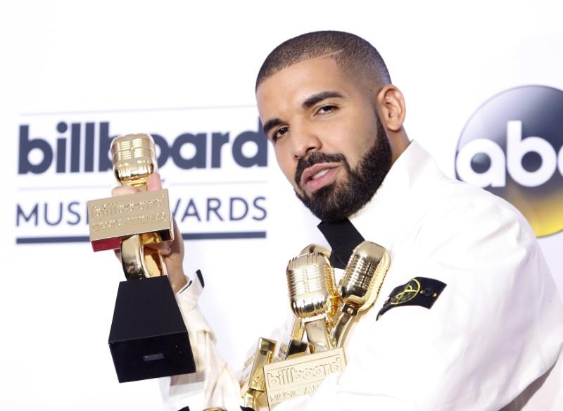 FILE PHOTO: 2017 Billboard Music Awards – Photo Room - Las Vegas, Nevada, U.S., 21/05/2017 - Drake with his many awards. REUTERS/Steve Marcus
