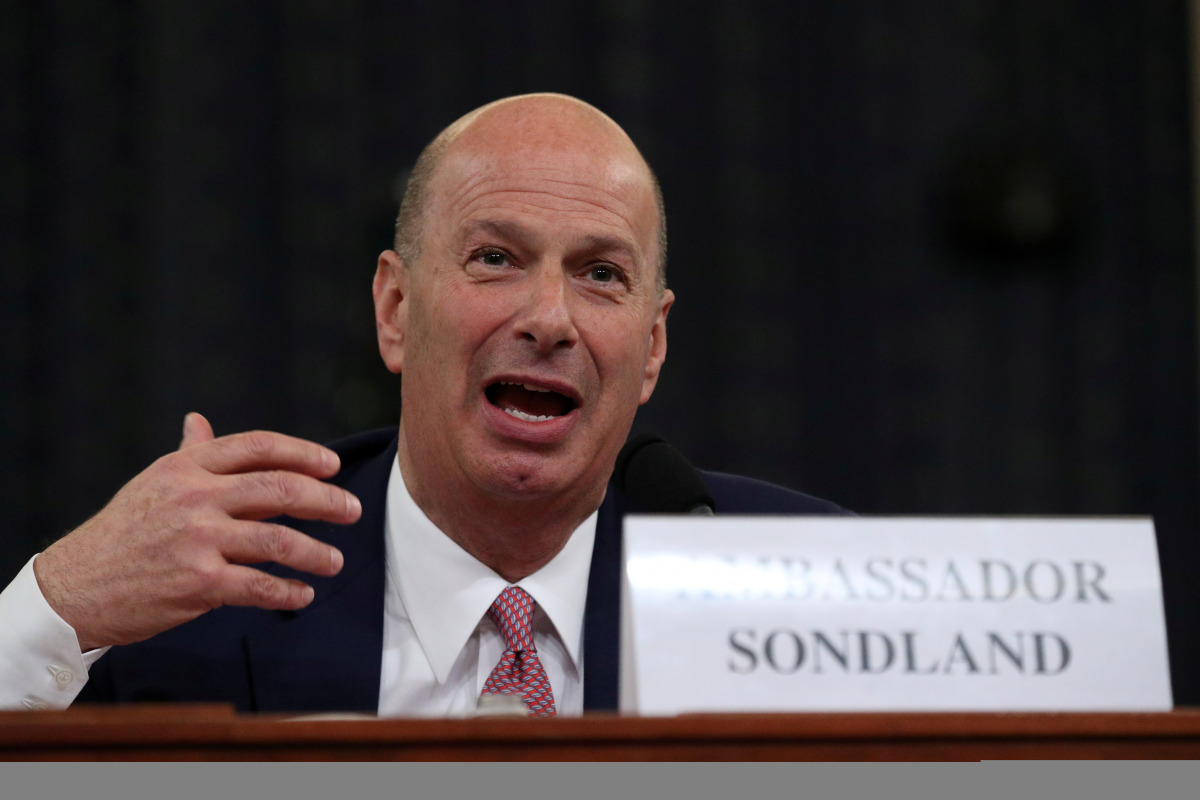 FILE PHOTO: U.S. Ambassador to the European Union Gordon Sondland testifies before a House Intelligence Committee hearing as part of the impeachment inquiry into U.S. President Donald Trump on Capitol Hill in Washington, U.S., November 20, 2019. REUTERS/L