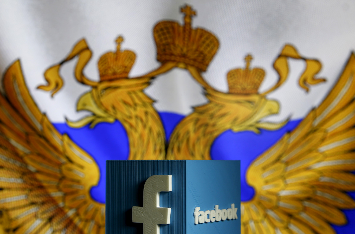 FILE PHOTO: A 3D model of the Facebook logo is seen in front of a Russian flag in this photo illustration taken in Zenica, Bosnia and Herzegovina, May 22, 2015. REUTERS/Dado Ruvic/File Photo
