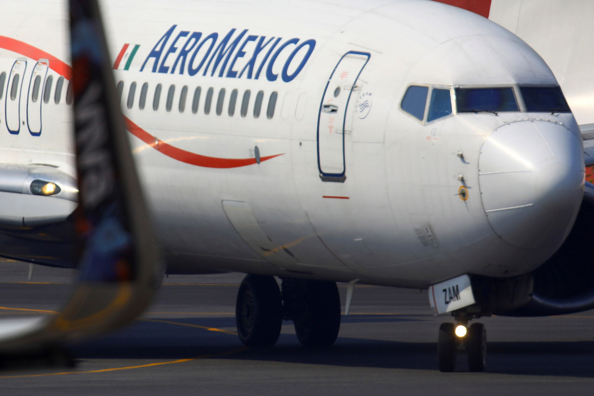 FILE PHOTO: An AeroMexico Airplane is pictured on the airstrip at Benito Juarez international airport in Mexico City, Mexico April 21, 2021. REUTERS/Edgard Garrido/File Photo
