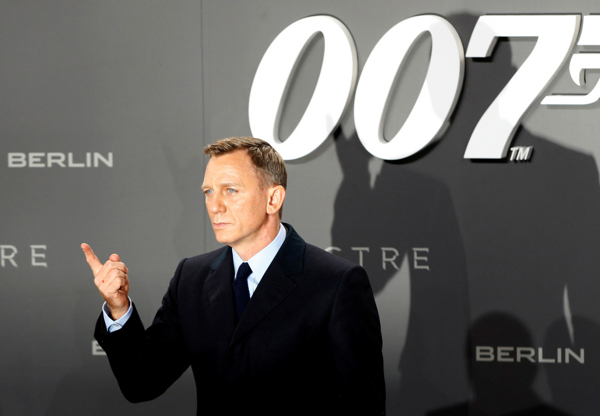 FILE PHOTO: Actor Daniel Craig poses for photographers on the red carpet at the German premiere of the new James Bond 007 film 