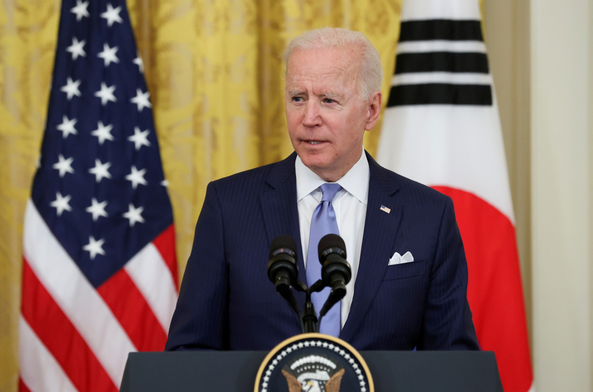 FILE PHOTO: U.S. President Joe Biden speaks to journalists at the White House, in Washington, U.S., May 21, 2021. REUTERS/Jonathan Ernst/File Photo
