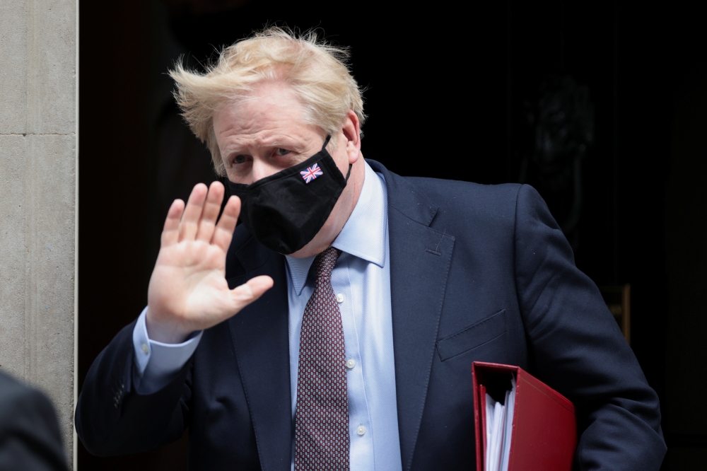 Britain's Prime Minister boris Johnson leaves Downing Street in London, Britain, May 26, 2021. REUTERS/Hannah McKay
