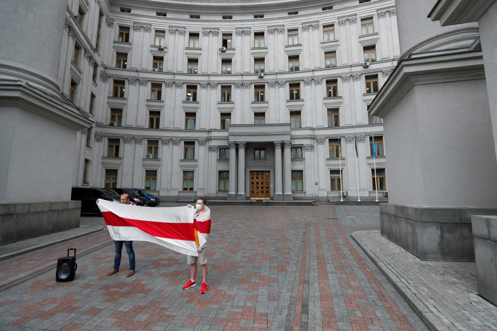 Activists attend a rally in support of Belarusian anti-government movement and detained blogger Roman Protasevich, in front of the Ministry of Foreign affairs in Kyiv, Ukraine May 28, 2021. REUTERS/Gleb Garanich