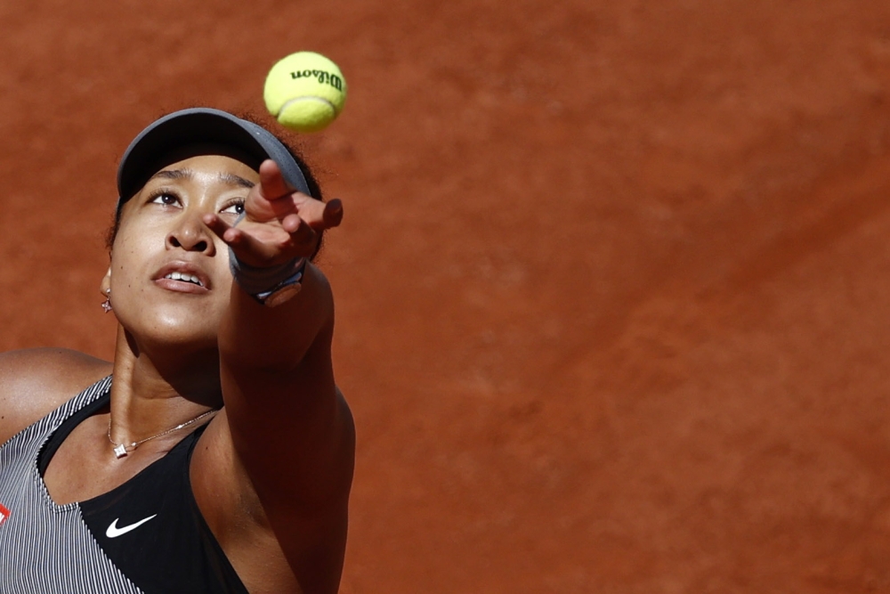 May 30, 2021 Japan's Naomi Osaka in action during her first round match against Romania's Patricia Maria Tig REUTERS/Christian Hartmann