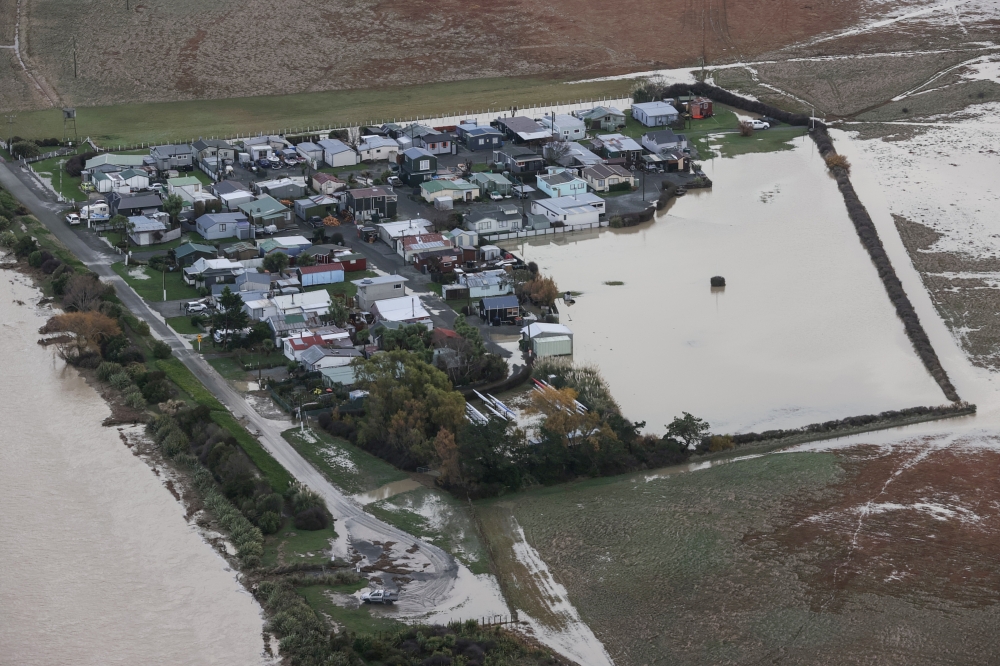 Floodwaters are pictured following a period of severe flooding in the South Island's Canterbury region, in Selwyn Huts, New Zealand, June 1, 2021. Chris Skelton/Pool via REUTERS