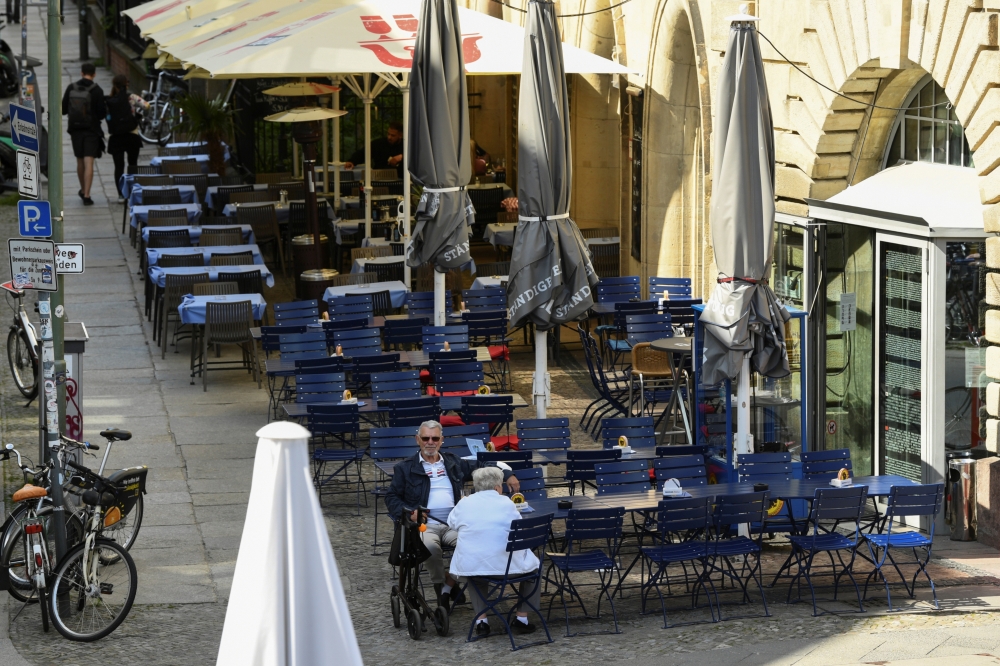 Empty seats and tables in front of a restauarant are pictured amid the coronavirus disease (COVID-19) pandemic, in Berlin, Germany May 30, 2021. REUTERS/Annegret Hilse