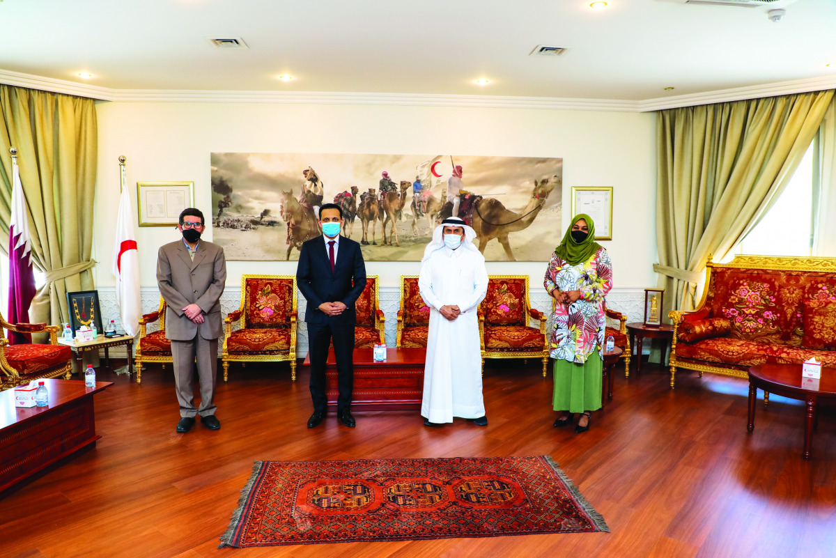 Ambassador of Sri Lanka to Qatar, H E Mohamed Mafaz Mohideen, Secretary-General of Qatar Red Crescent Society (QRCS), Ali bin Hassan Al Hammadi, with other officials.