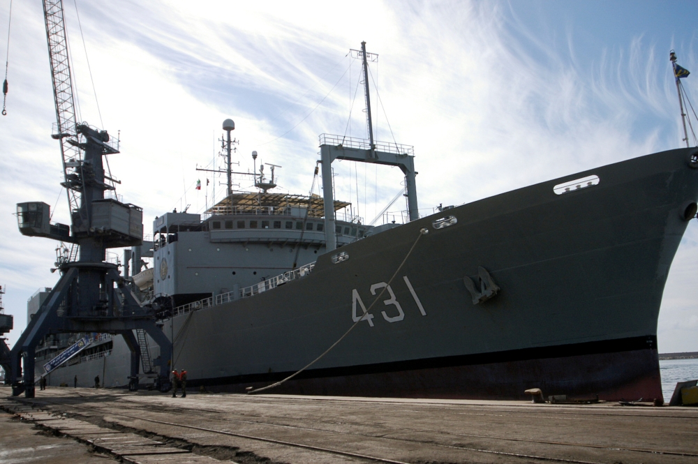 File photo: Iranian Kharg warship is pictured at a dock in the Syrian coastal city Latakia February 25, 2011. Reuters/Davoud Poorsehat/IRNA/File Photo