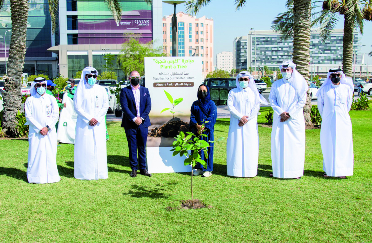 Officials from the Ministry of Municipality and Environment (MME) and Qatar Rail during the the ‘Plant a Tree’ initiative at the Airport Park, yesterday.