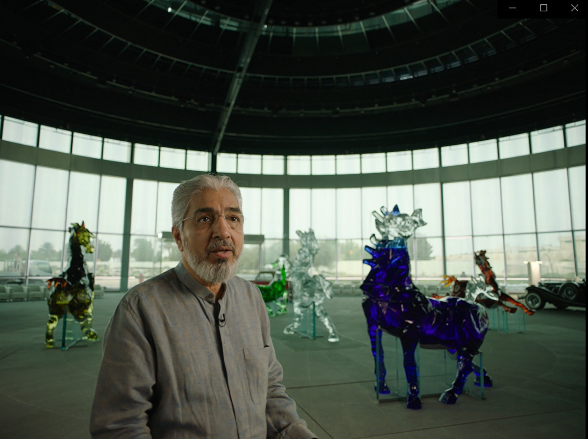 Mustafa Husain, with ‘Seeroo fi al ardh’ in the backdrop.