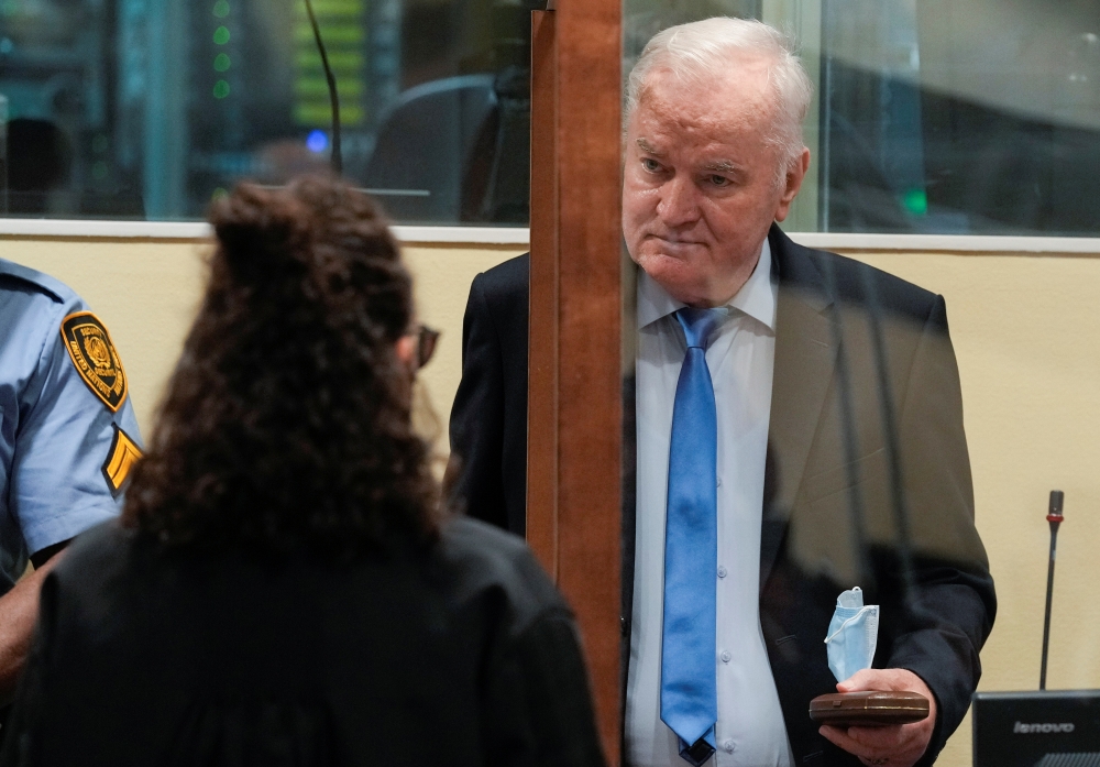 Former Bosnian Serb military leader Ratko Mladic enters the courtroom prior to the pronouncement of his appeal judgement at the UN International Residual Mechanism for Criminal Tribunals (IRMCT) in The Hague, Netherlands June 8, 2021. Peter Dejong/Pool vi