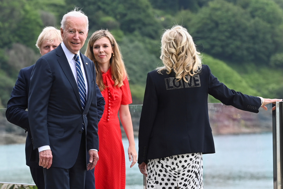 U.S. first lady Jill Biden wearing a jacket with the word 