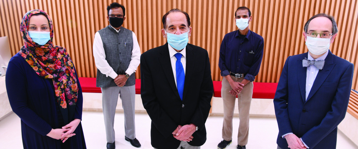 The authors of the study pose for a photograph.