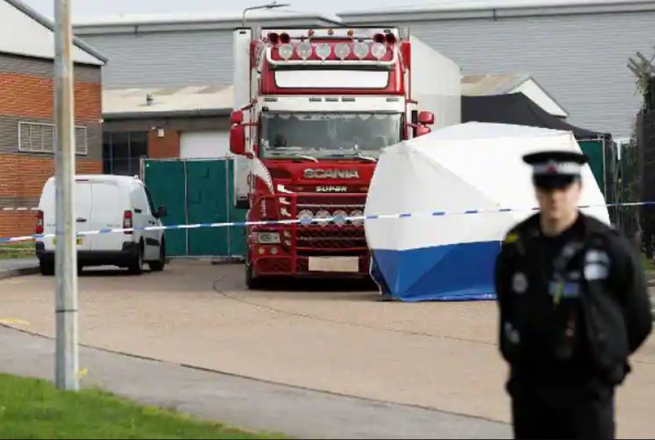 File photo of police team at the scene where bodies were discovered in the back of the truck on an industrial estate to the east of London